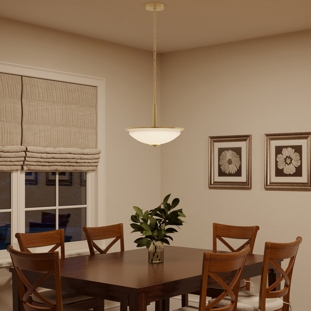 Dining room with wooden table and chairs, pendant light, and framed artwork on the wall. 