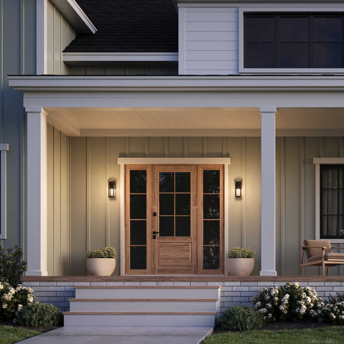 Front porch of a house with a wooden door, steps, and decorative elements.