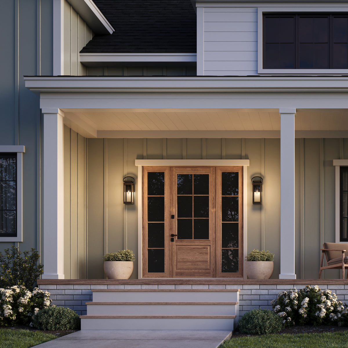 Front entrance of a house with a wooden door, steps, and decorative elements. 